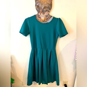 Knee length empire waist teal dress